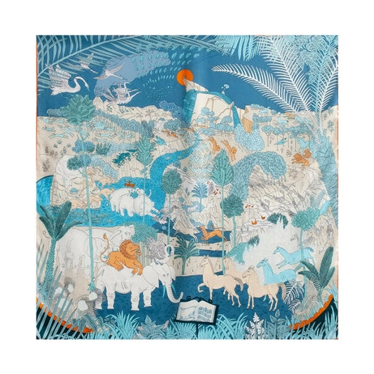 Large silk square scarf with blue animal kingdom print, exotic wildlife details, and soft crepe satin texture.