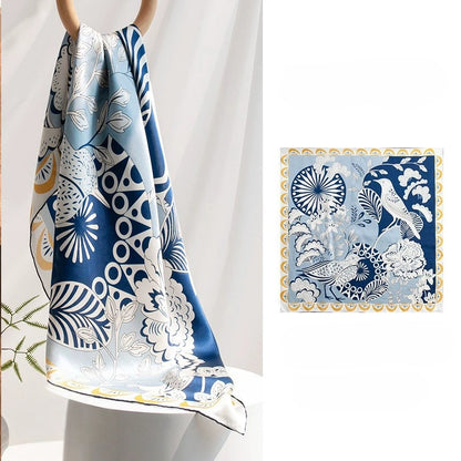 Large silk square scarf with blue bird, floral, and abstract art print on soft 100% mulberry silk.
