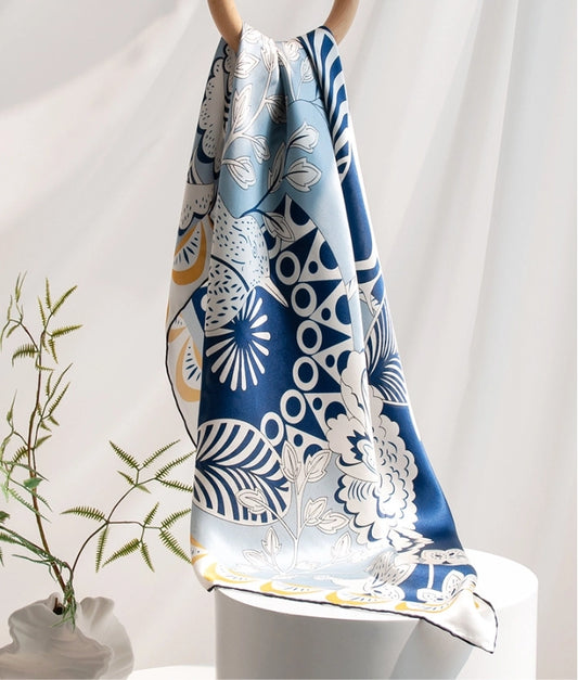 100% mulberry silk large square scarf styled with blue bird and floral artwork for elegant daily wear.