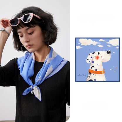 Blue dalmatian print 100% mulberry silk square scarf styled as a neckerchief on a fashion model