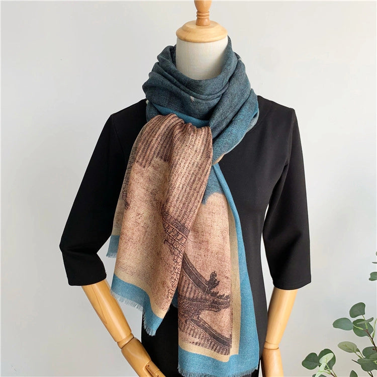 Blue Oriental crane wool scarf styled in a soft neck loop with the pavilion panel in front
