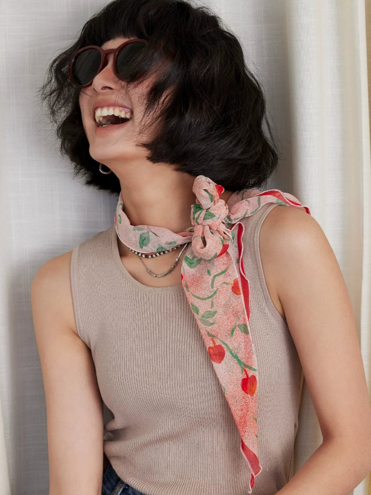 Blush pink mulberry silk georgette scarf styled as a soft romantic neck scarf