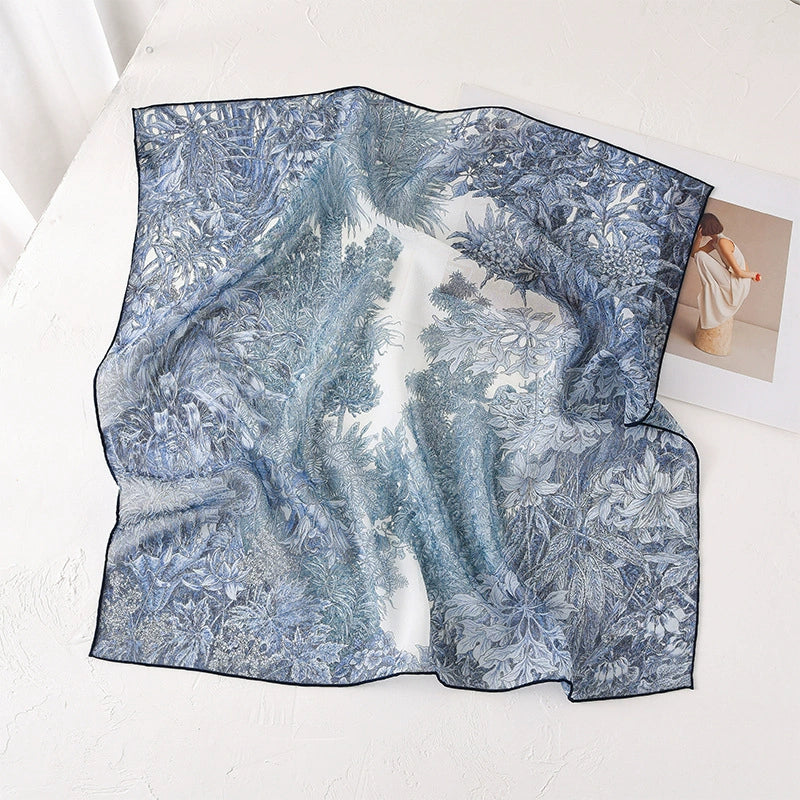 Blue botanical print mulberry silk square scarf in lightweight sheer chiffon texture