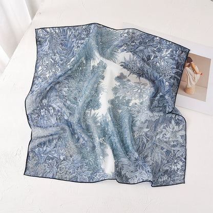 Blue botanical print mulberry silk square scarf in lightweight sheer chiffon texture