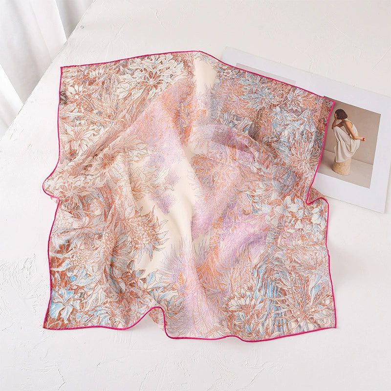 Pink botanical mulberry silk square scarf with soft sheer finish and elegant floral pattern