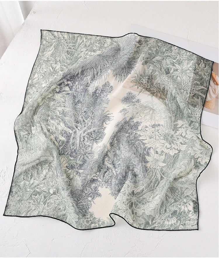 Deep green botanical print mulberry silk square scarf displayed flat