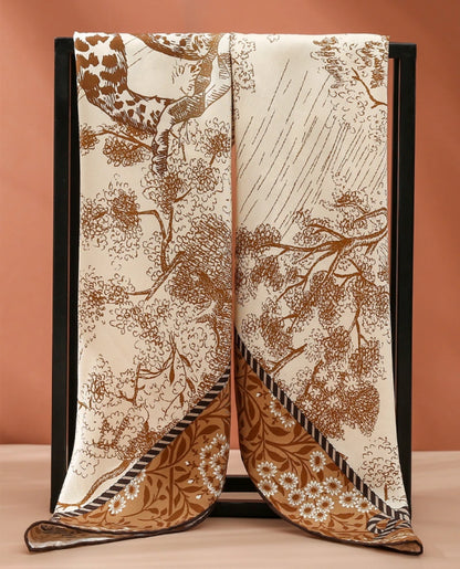 Brown cheetah forest mulberry silk square scarf showing full print, soft silk texture, and decorative border