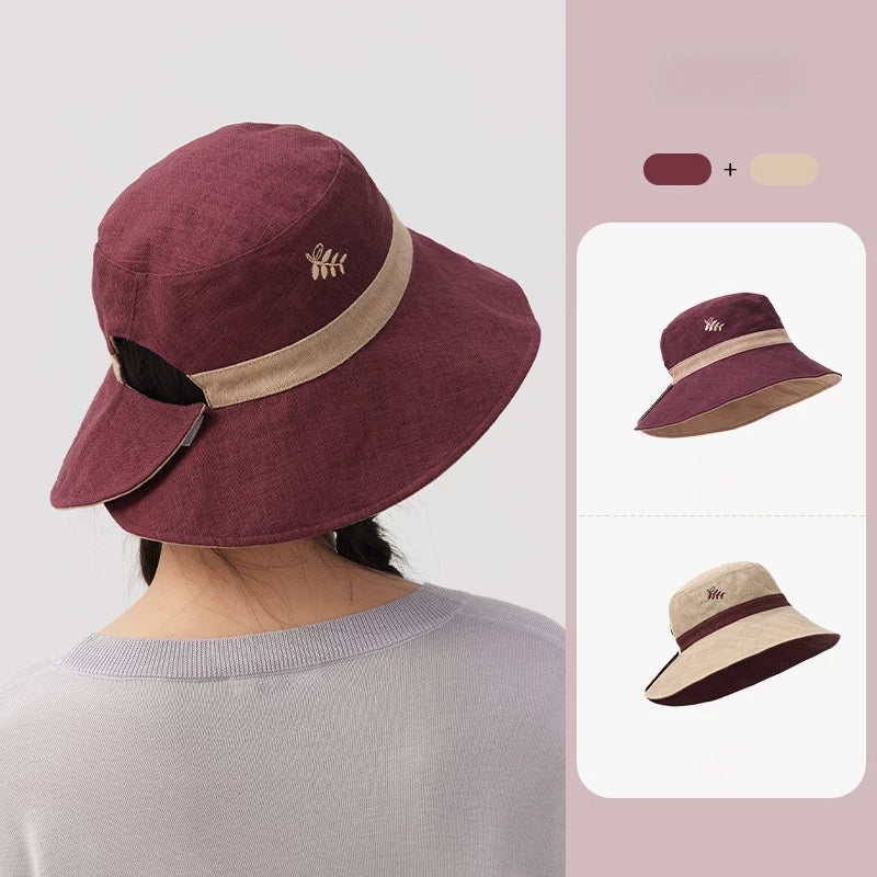 Burgundy beige reversible embroidered bucket hat shown from the back with two-sided color options