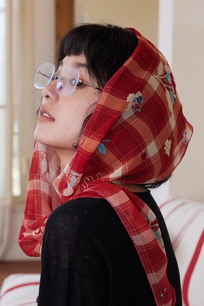 Burgundy plaid silk twilly styled as a headscarf, crafted from lightweight 100% mulberry silk georgette