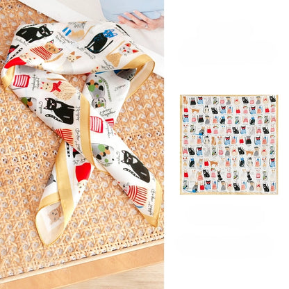 Small silk square scarf with colorful cat print, styled flat to show the full 100% mulberry silk design.