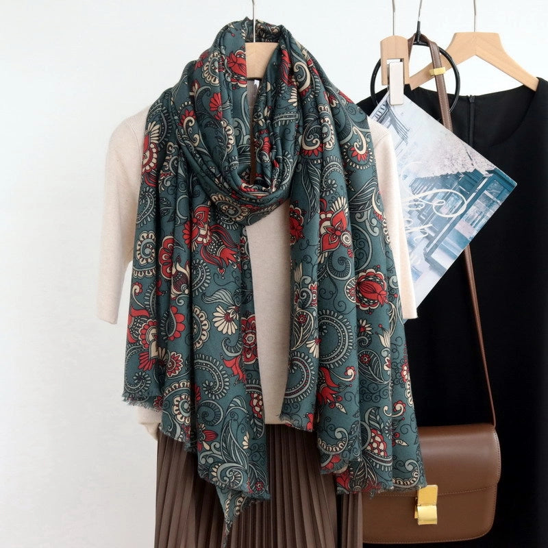 Vintage dark green floral wool scarf styled in a relaxed loop with long front panels
