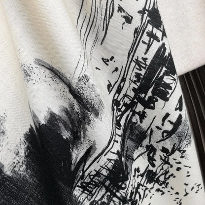 Close-up of silk wool scarf texture featuring a black ink-wash Eiffel Tower illustration
