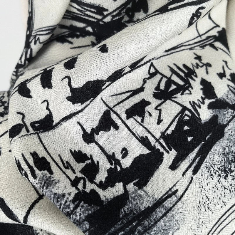 Close-up of monochrome Paris sketch and handwritten details on the Eiffel Tower silk wool scarf