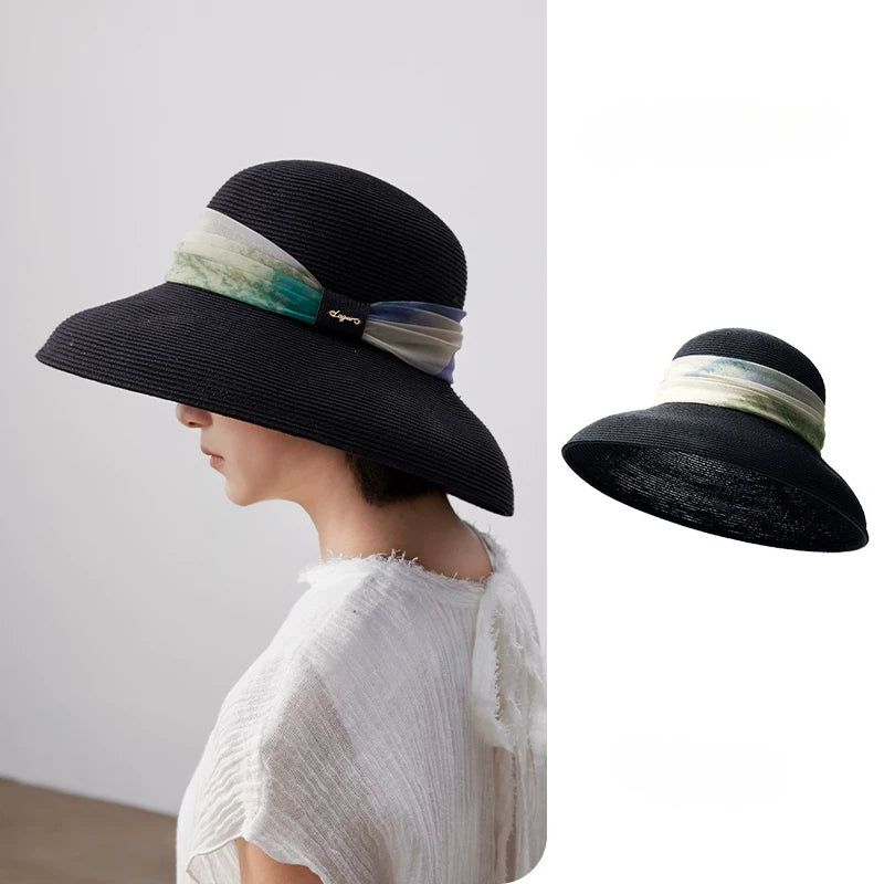 Elegant black scarf ribbon wide brim sun hat for women, side view with matching product cutout.