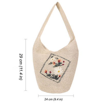 Ivory woven straw shoulder bag with floral embroidery and size measurement for summer essentials