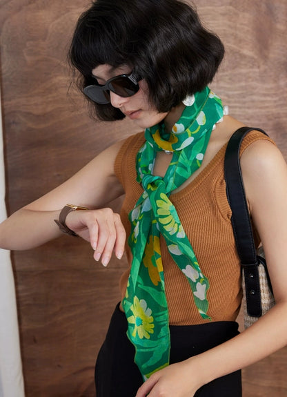 Forest green floral silk neckerchief styled as a lightweight summer accessory for women