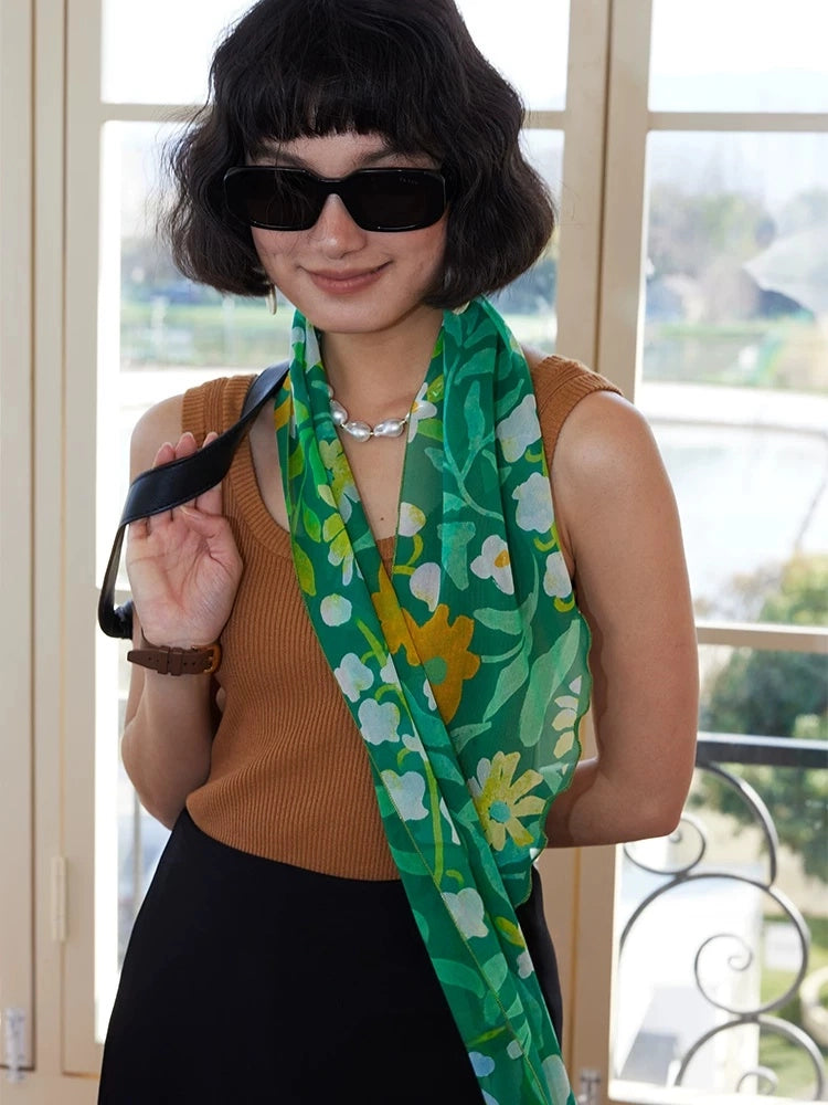 Forest green skinny silk scarf in silk georgette styled with sunglasses and sleeveless top