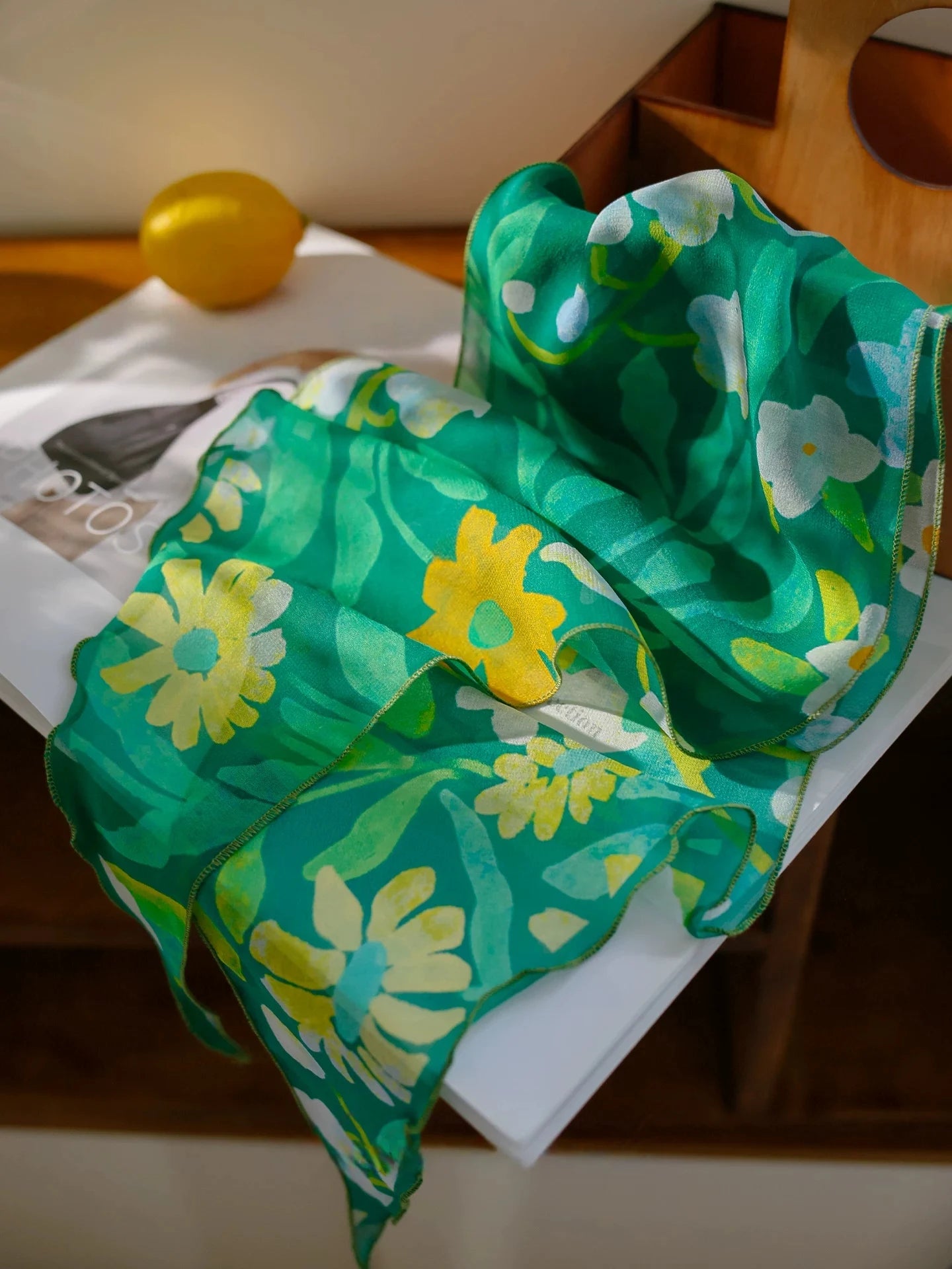Forest green botanical print silk georgette scarf detail showing floral pattern and sheer texture