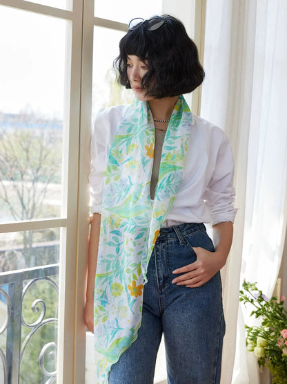 Fresh green long silk scarf styled as a lightweight neck scarf with casual white shirt outfit