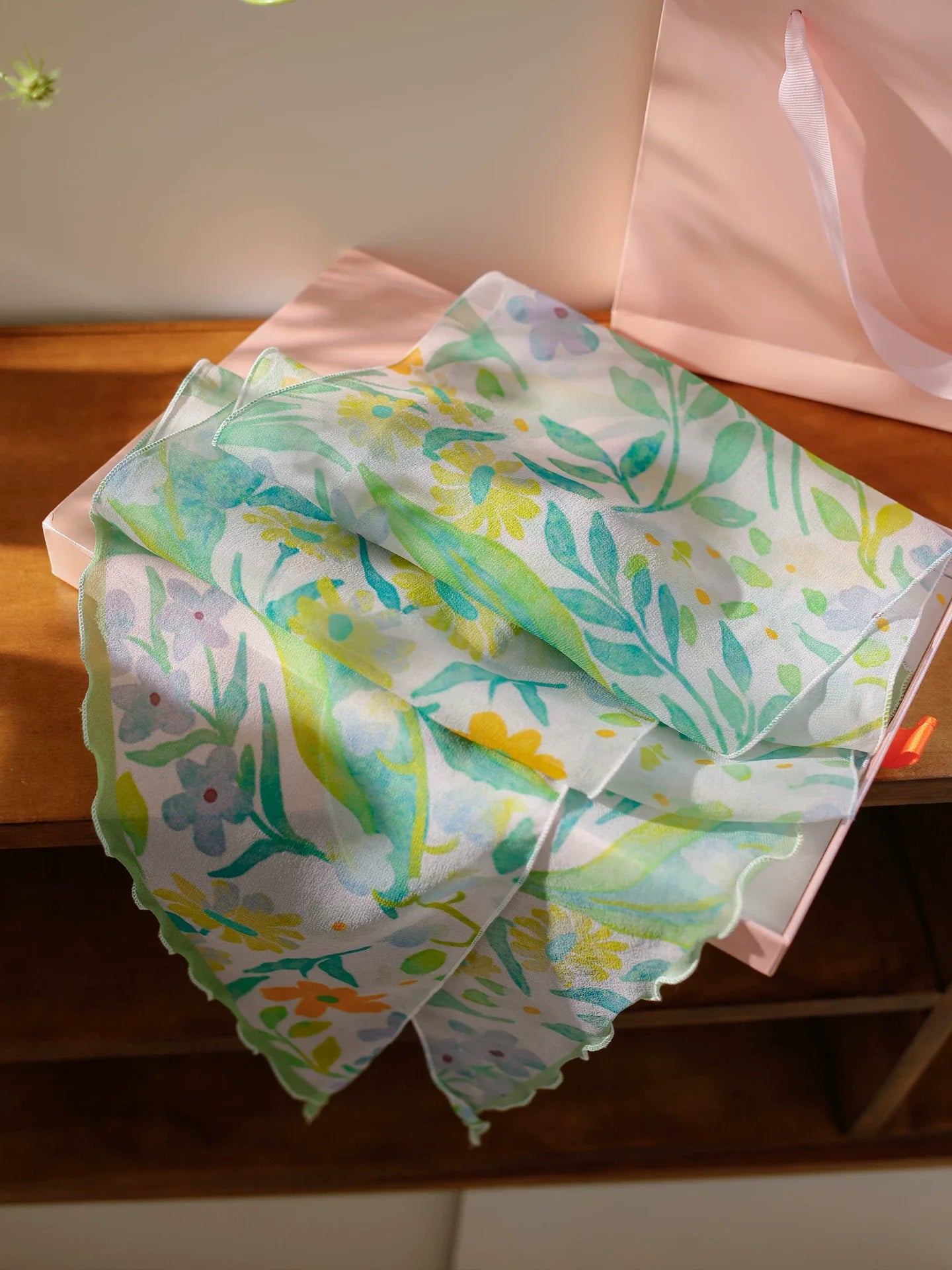 Fresh green botanical print silk georgette scarf detail showing soft floral pattern and sheer texture