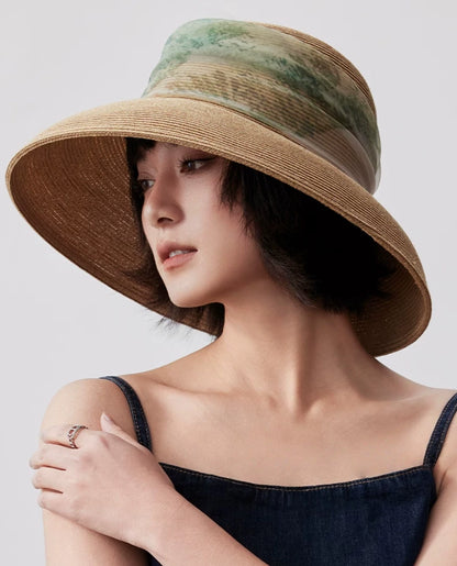 Front view of herbal beige wide brim sun hat with soft dome crown and scarf ribbon.