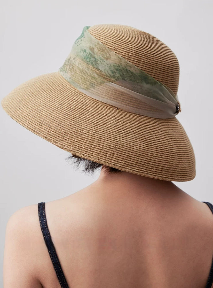 Rear view of herbal beige wide brim sun hat with dome crown and scarf ribbon.