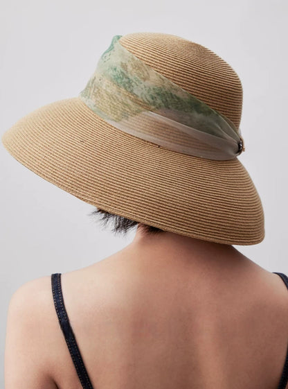 Rear view of herbal beige wide brim sun hat with dome crown and scarf ribbon.