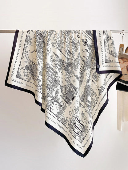 Ivory cityscape printed silk wool square scarf displayed open with a navy border