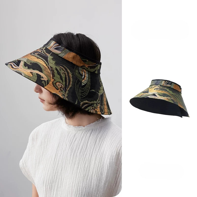 Jacquard wide brim sun visor hat with vintage pattern, open top design, and adjustable fit for summer travel.