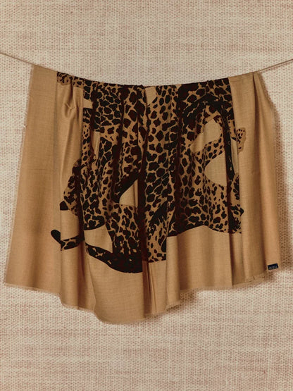 Khaki oversized wool scarf with an artistic leopard graphic, displayed flat to show the animal-inspired design