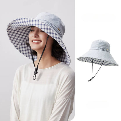Woman wearing light blue cotton wide brim sun hat with plaid lining and wind cord, shown with product view
