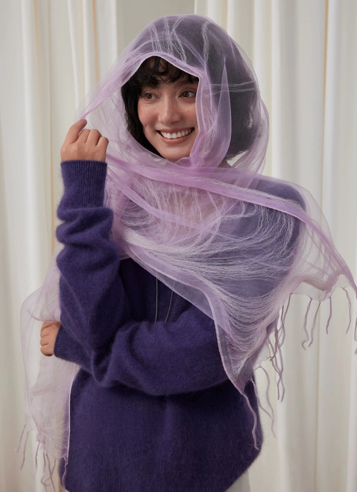 Light purple silk fringe scarf draped loosely over the head, neck, and shoulders