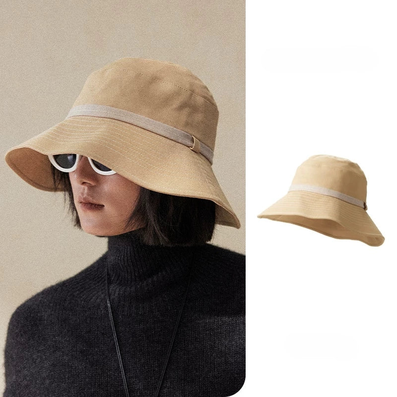 Light wheat wide brim UV protection bucket hat with adjustable fit and elegant stitched brim