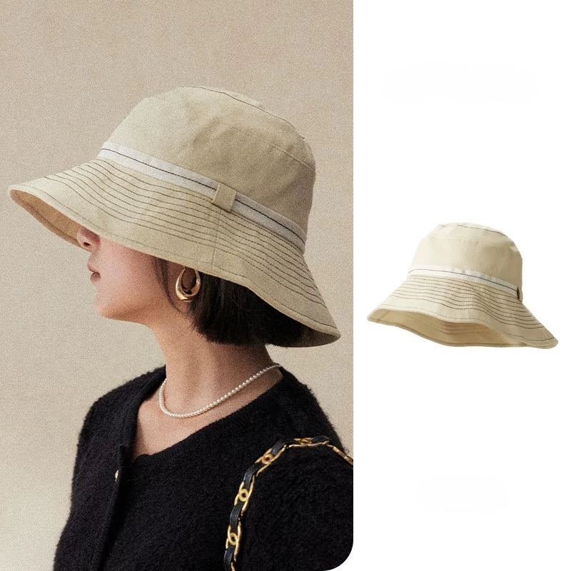 Milky apricot wide brim UV protection bucket hat with adjustable fit and elegant stitched brim