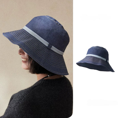 Mist blue wide brim UV protection bucket hat with adjustable fit and elegant contrast band