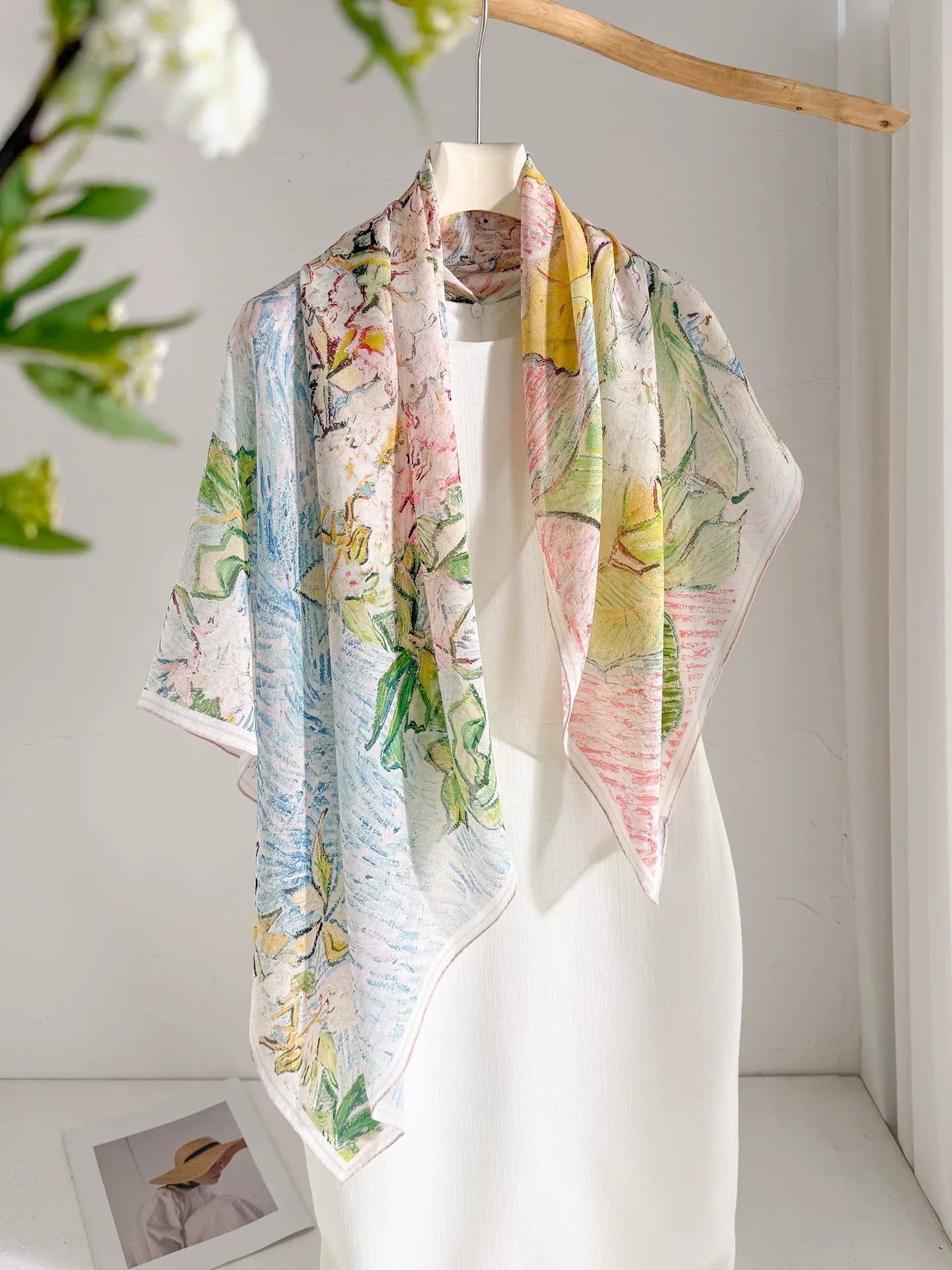 Pastel floral mulberry silk georgette scarf draped over a white dress for elegant summer styling