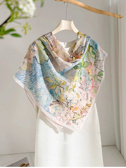 Large floral silk square scarf styled in a front triangle over a white dress
