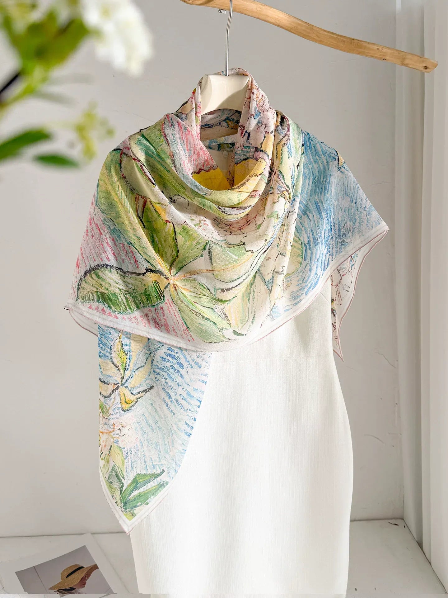 Monet-inspired mulberry silk scarf wrapped around the neck as a lightweight pastel shawl