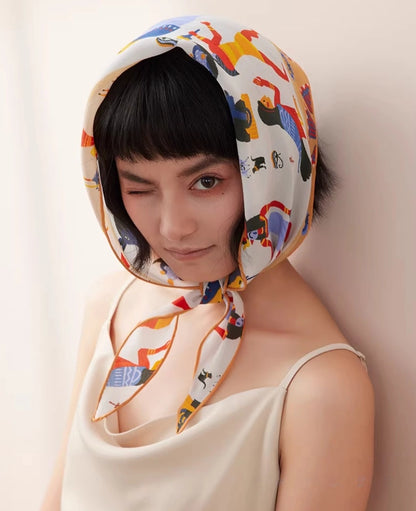 Mulberry silk scarf worn as a head scarf, tribal print elegant fashion styling