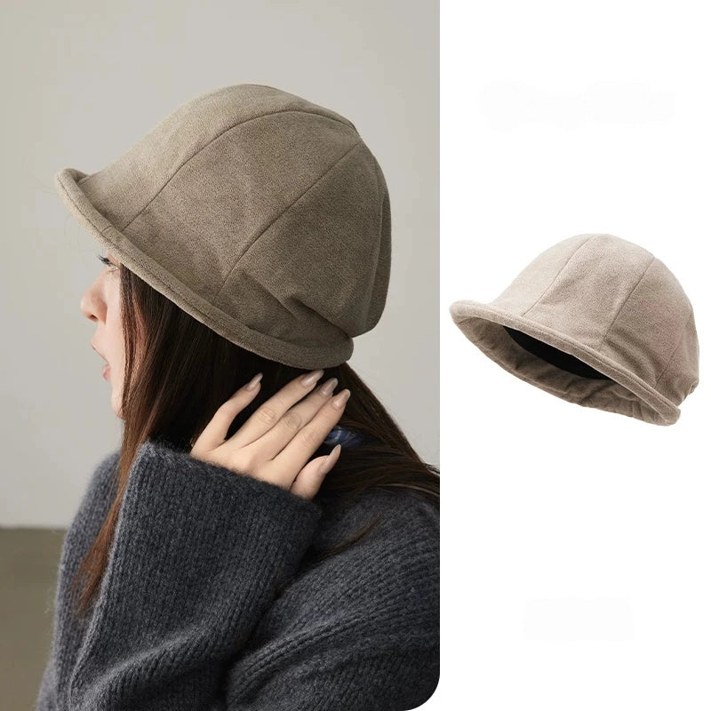 Oatmeal greige rolled brim felt cloche hat shown on a model and in a standalone side view