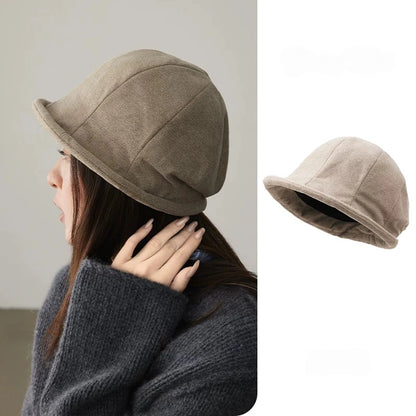 Oatmeal greige rolled brim felt cloche hat shown on a model and in a standalone side view