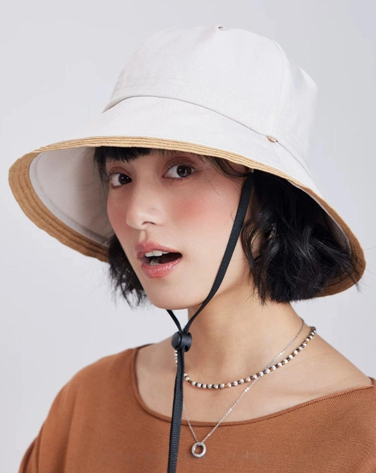 off-white foldable sun hat with chin strap and wide brim for beach travel and outdoor wear