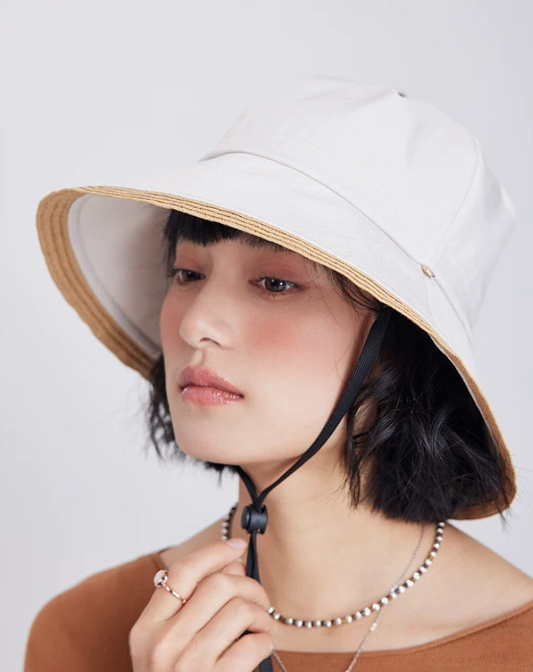 off-white wide brim bucket hat styled with minimalist summer outfit and sun coverage