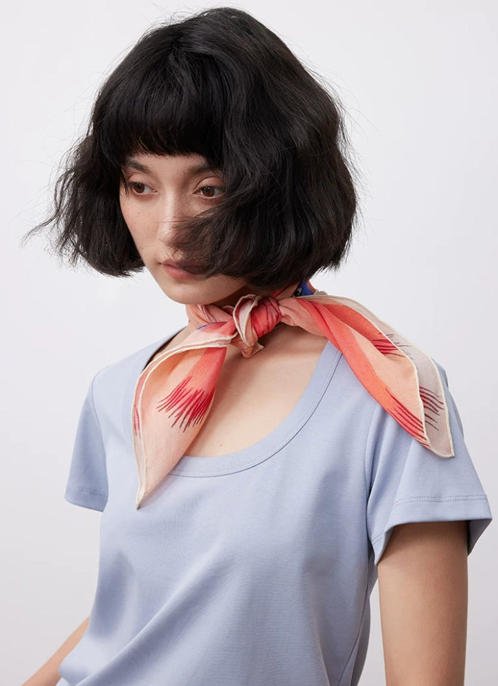 Pink bird and floral silk scarf tied as a chic real silk neckerchief for women