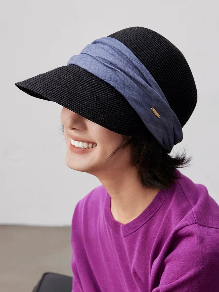 Classic black beach visor hat with curved brim and blue ribbon for outdoor sun protection