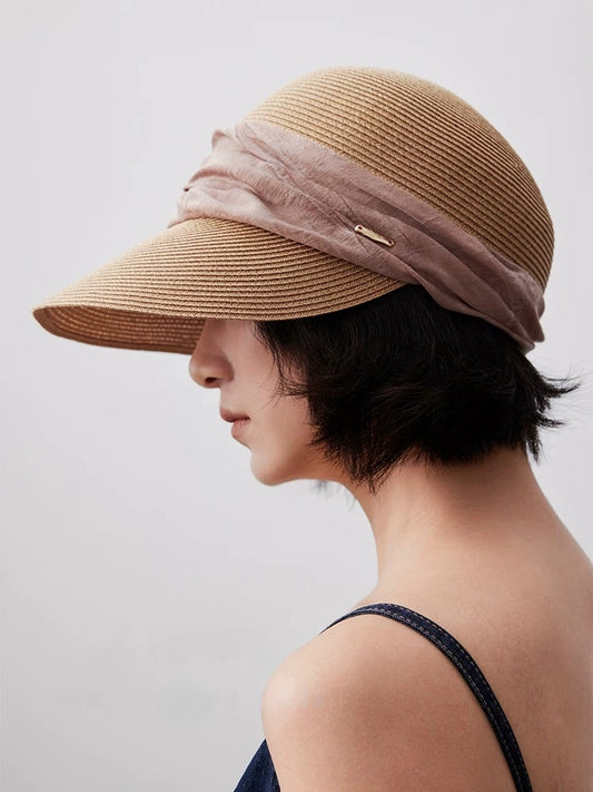 Natural beige sun visor hat with pleated dusty rose ribbon and curved brim