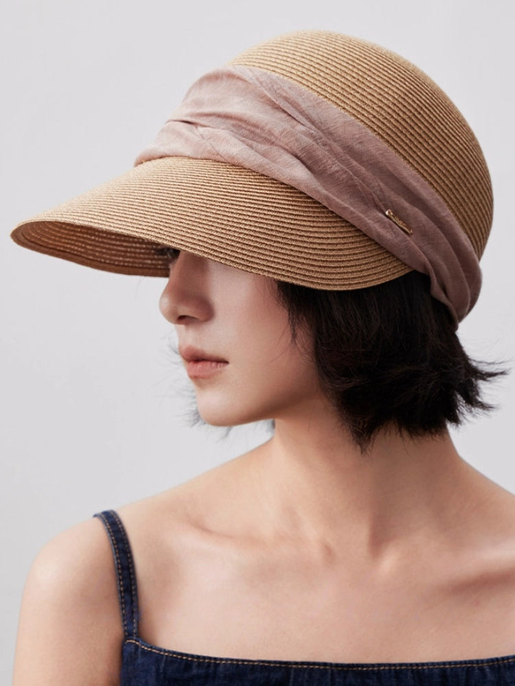 Natural beige sun protection visor hat styled with a navy summer top