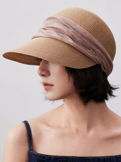 Natural beige sun protection visor hat styled with a navy summer top