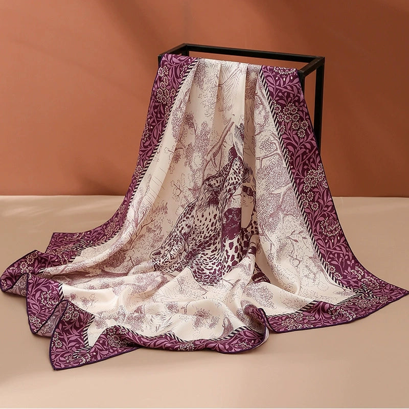 Purple cheetah forest 100% mulberry silk square scarf displayed with romantic drape and elegant luxury sheen