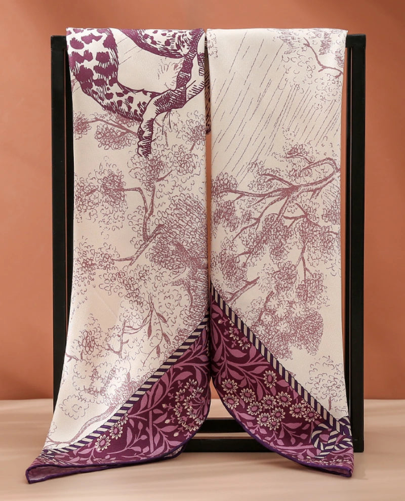 Purple cheetah forest mulberry silk square scarf showing full design, soft silk texture, and artistic border print